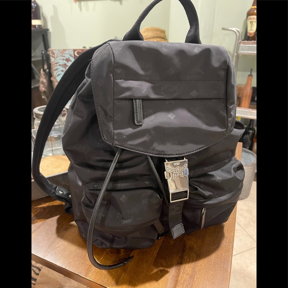 Authentic MCM black back pack  excellent condition